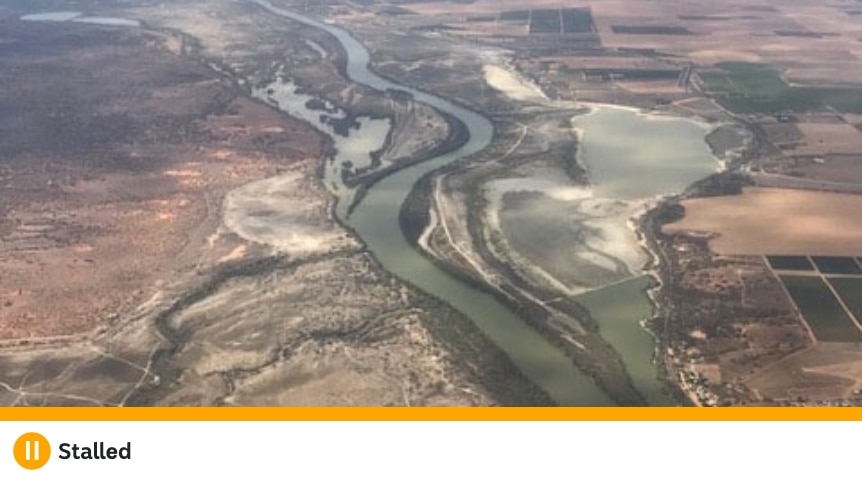 An aerial shot of a river in the outback