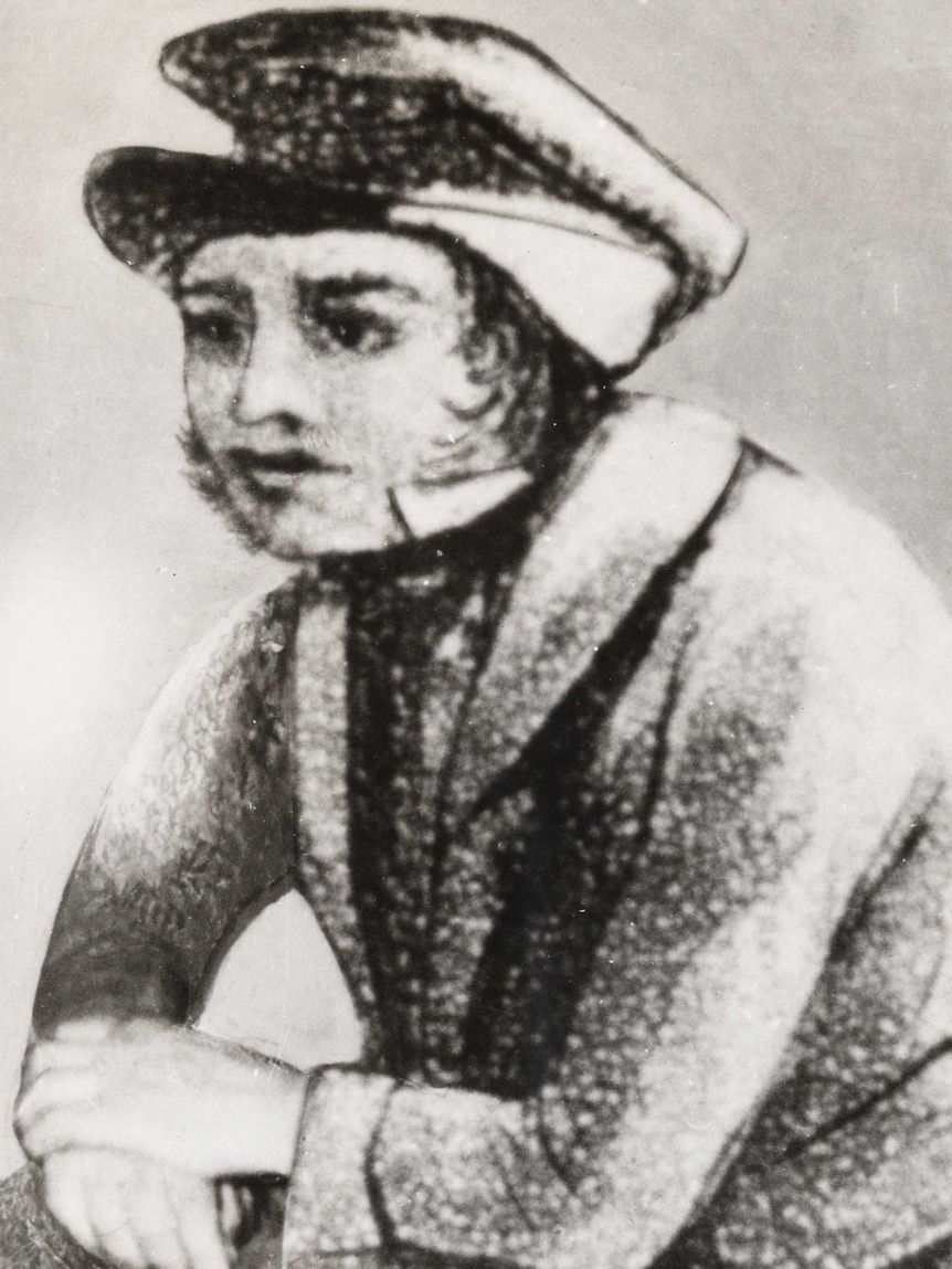 A black and white sketch of a man wearing a hat and jacket.