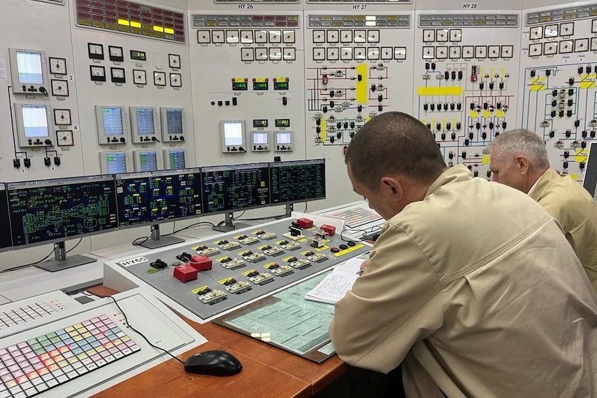 Employees work at the Russian-controlled Zaporizhzhia Nuclear Power Plant 