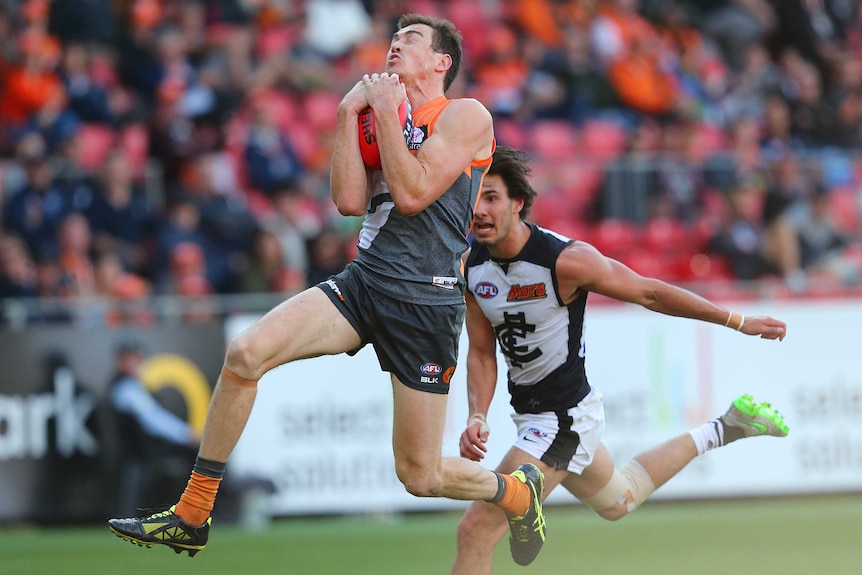 Jeremy Cameron marks against Carlton