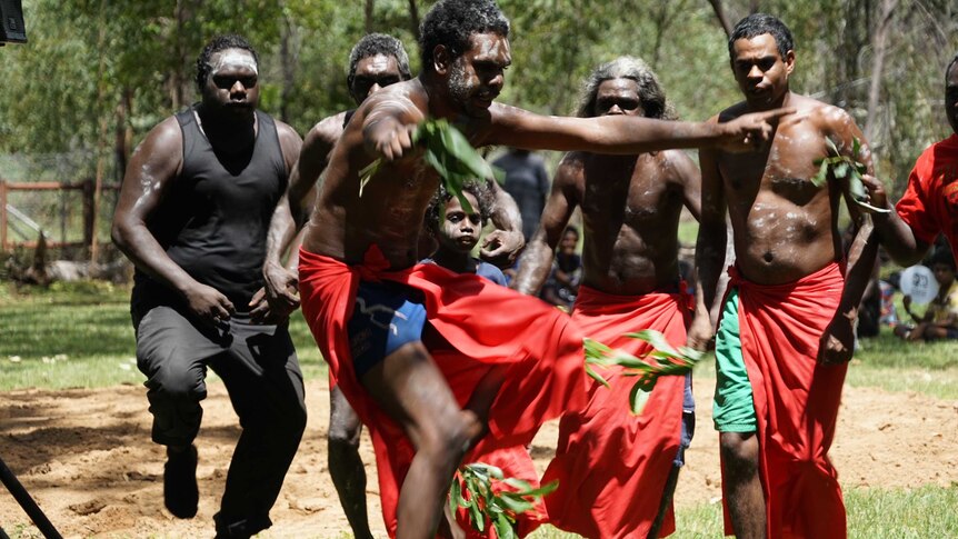Traditional dancers perform at an event in Nitmiluk National Park.