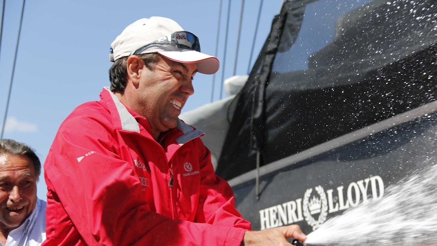 Wild Oats XI skipper Mark Richards celebrates