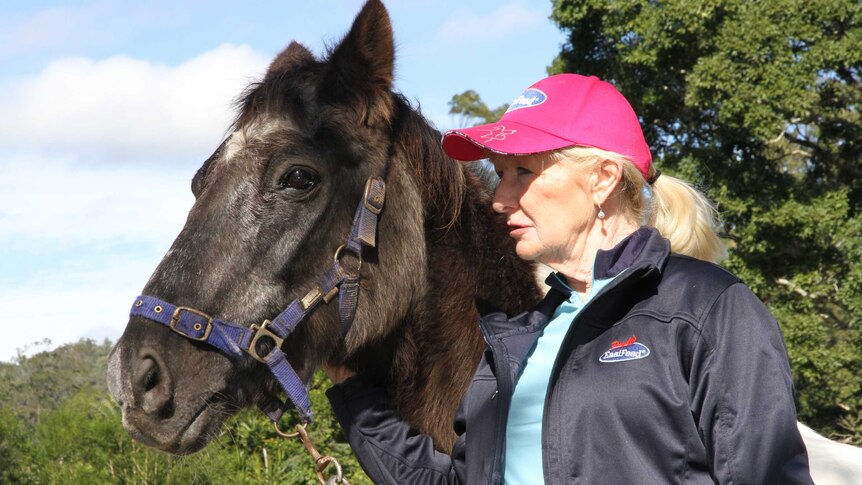 50 year old 'Calypso' with his carer Jenny Dyson-Holland at a property in the Tallebudgera Valley in the Gold Coast hinterland