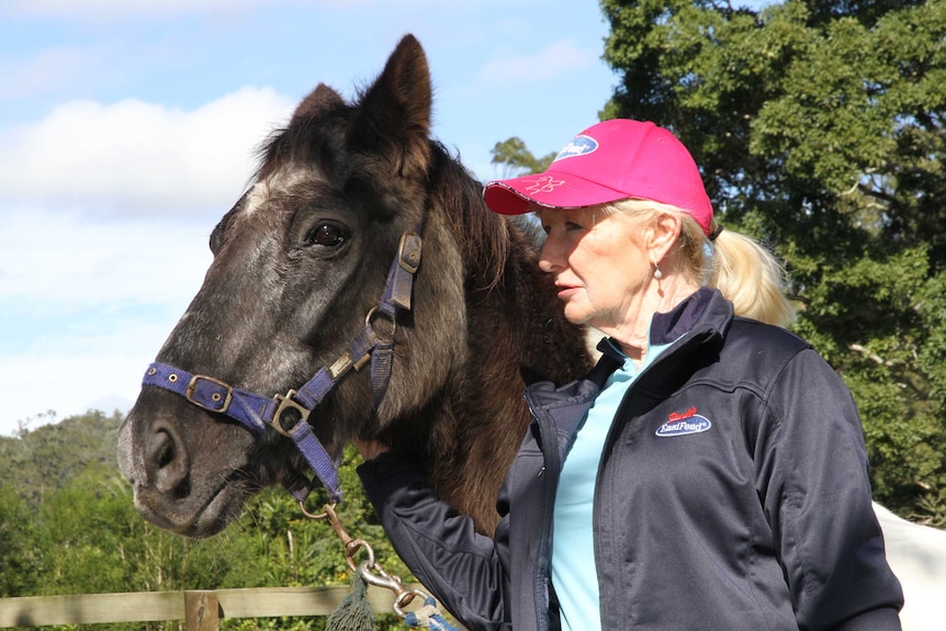 50 year old 'Calypso' with his carer Jenny Dyson-Holland at a property in the Tallebudgera Valley in the Gold Coast hinterland