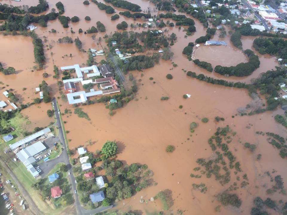 Aerial of flooded Richmond River High School and Lismore greyhound track