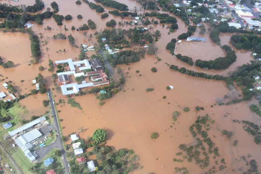 Aerial of flooded Richmond River High School and Lismore greyhound track
