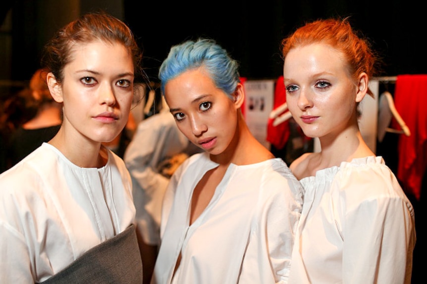 Three models at Fashion Week Australia.