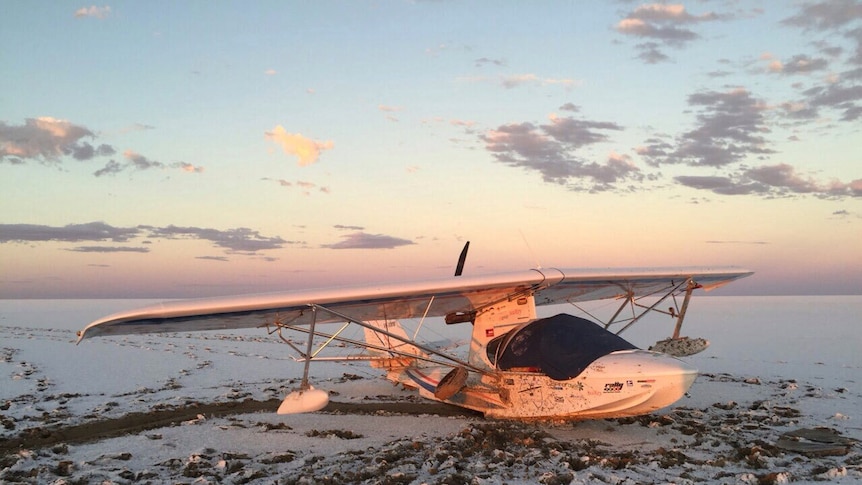 A light aircraft rests on the sands of Lake Eyre in outback South Australia after an emergency landing.