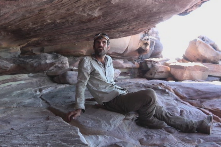 Mr Atkinson in the cave where the German pilots were rescued.