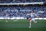 Jeremy Cameron kicks a goal from outside 50 for Geelong