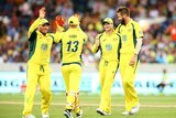 Winning streak ... Australia celebrates a wicket during the one-day international against India at Manuka Oval