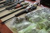Firearms and drugs seized by police in Tasmania and Victoria
