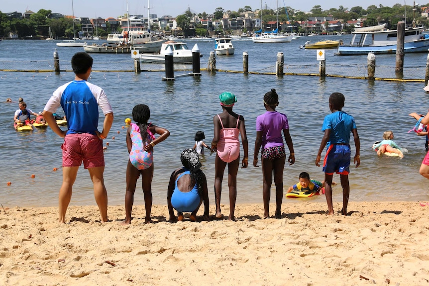 Refugee kids get ready to swim at Greenwich baths