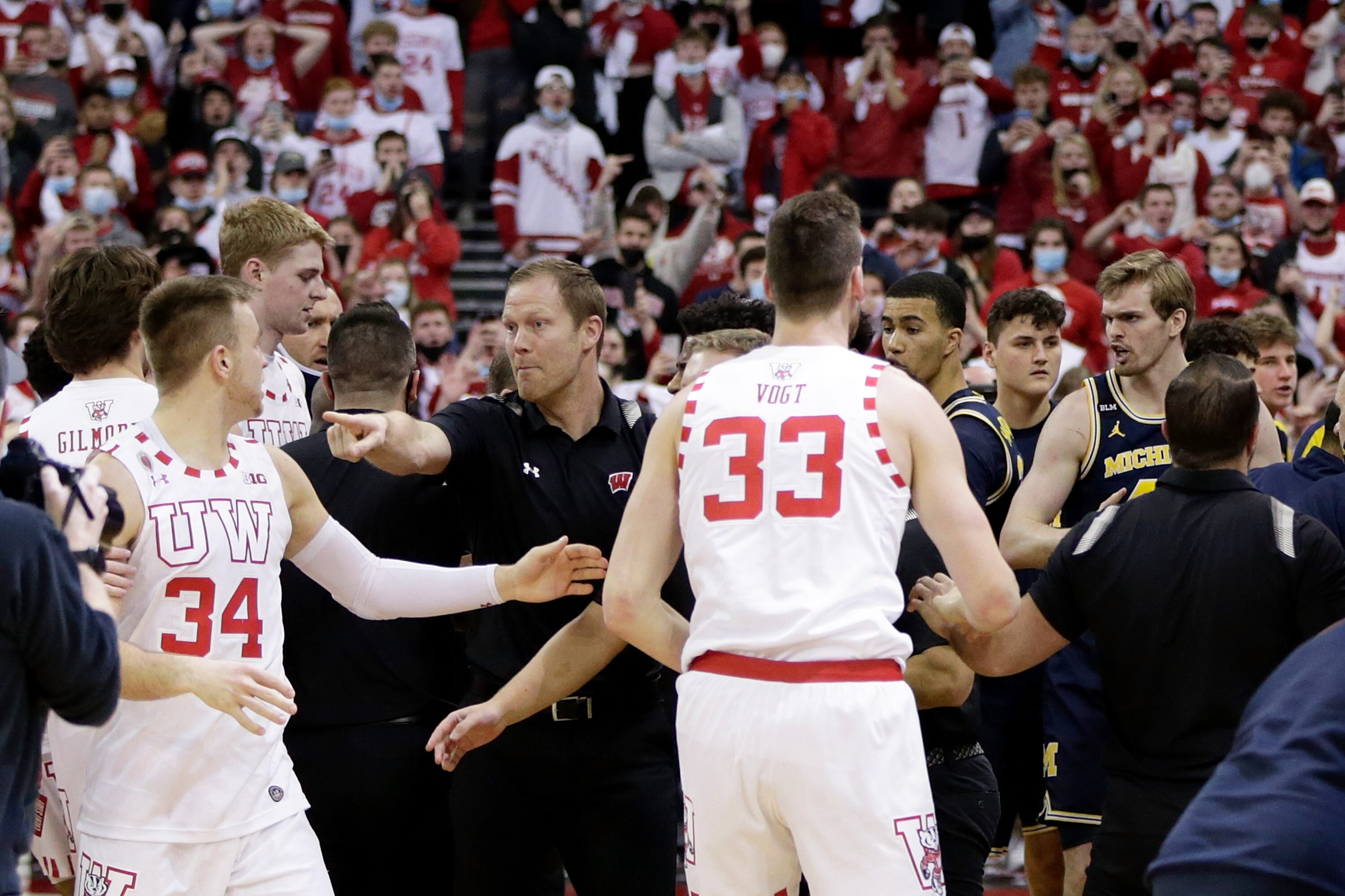 Brawl Breaks Out Following NCAA Basketball Game After Michigan Coach ...