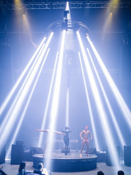 Performers under lights at MOFO 2018.