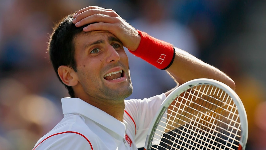 Five-set struggle ... Novak Djokovic reacts during his semi-final match against Stanislas Wawrinka