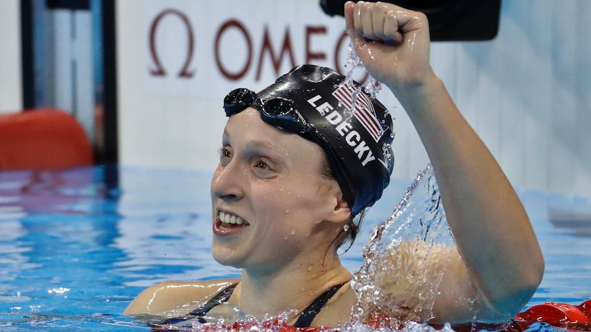 Unites States' Katie Ledecky celebrates after winning gold in the women's 800-meter freestyle