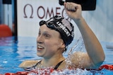 Unites States' Katie Ledecky celebrates after winning gold in the women's 800-meter freestyle