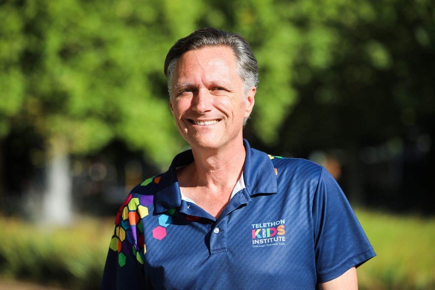 Professor Jonathan Carapetis wearing a Telethon Kids Institute polo shirt.