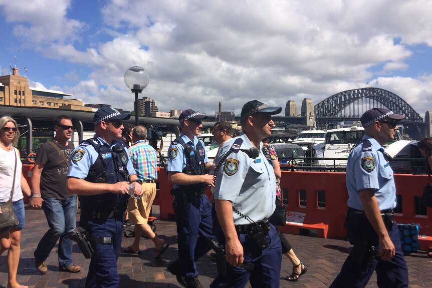 Police patrol Sydney's Circular Quay ahead of New Years Eve celebrations.
