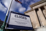 A sign that says CLOSED in capital letters outside the US National Archive during the federal government shutdown.