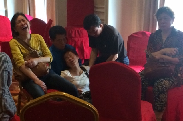 A woman in Nanjing weeps as she waits to hear news about relatives on the Yangtze ferry disaster