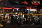 Police at scene of night markets blast