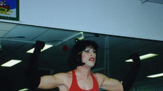 Fanny Cracker teaching an aerobics class in the 1990's wearing high heels.