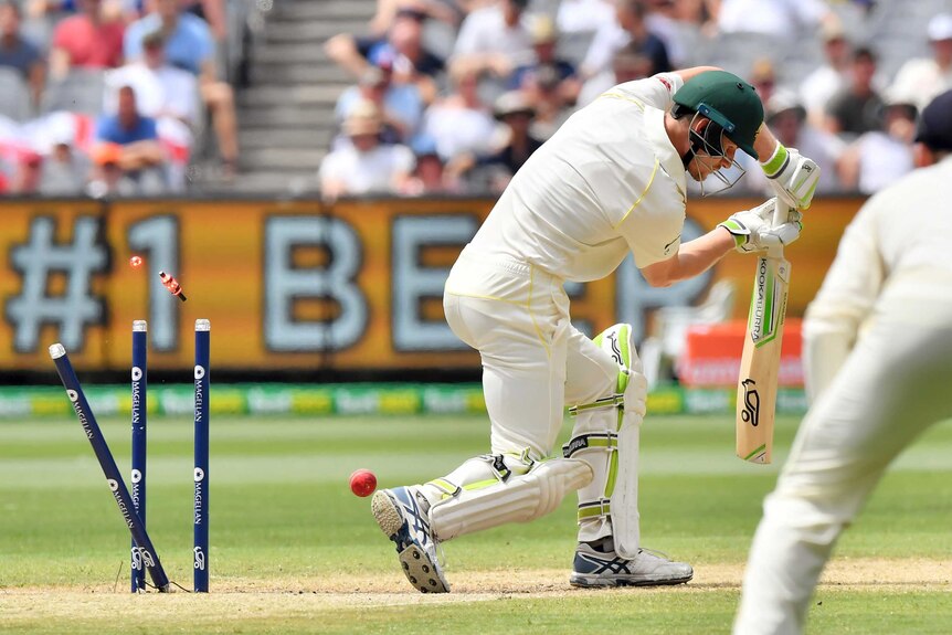 Australia's Cameron Bancroft chops onto his stumps.