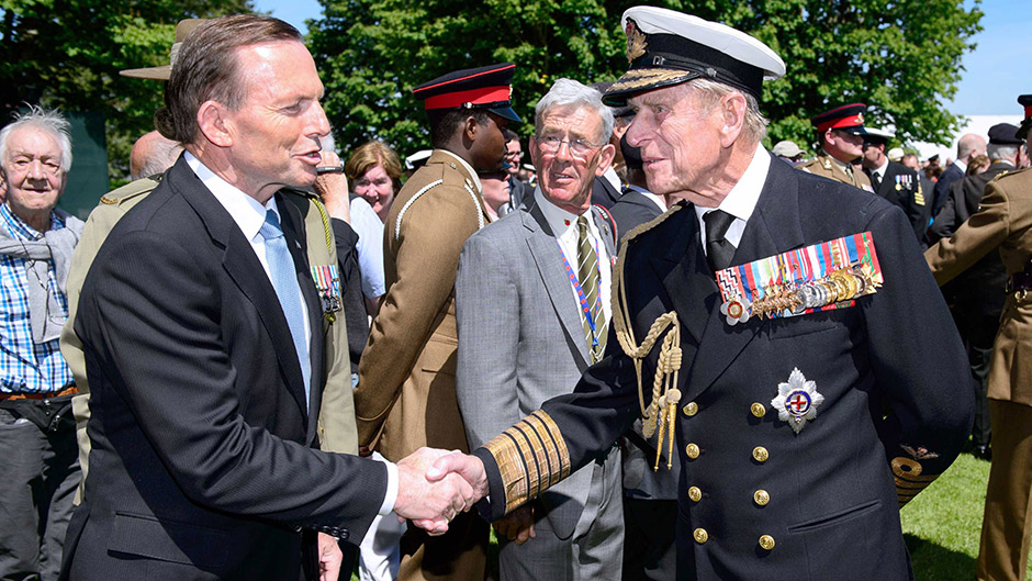 Tony Abbott greets Prince Philip following a British D-Day commemoration ceremony in northern France on June 6, 2014.