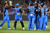 Adelaide Strikers players congratulate each other during their BBL semi-final against the Renegades.