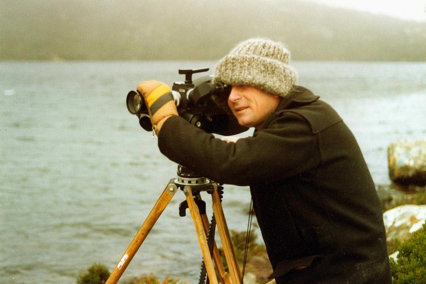 Cameraman Warwick Curtis filming in an aged, but undated photo