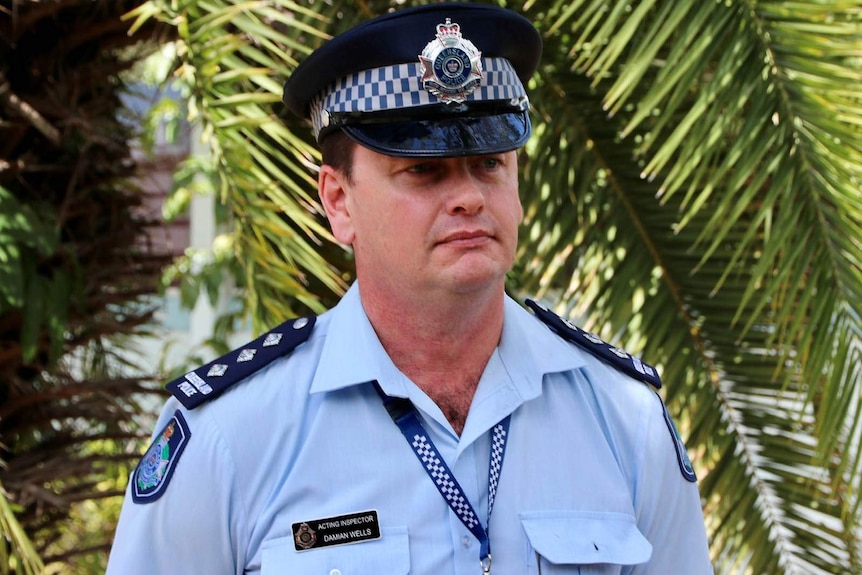 Headshot of Queensland police officer Acting Inspector Damien Wells.