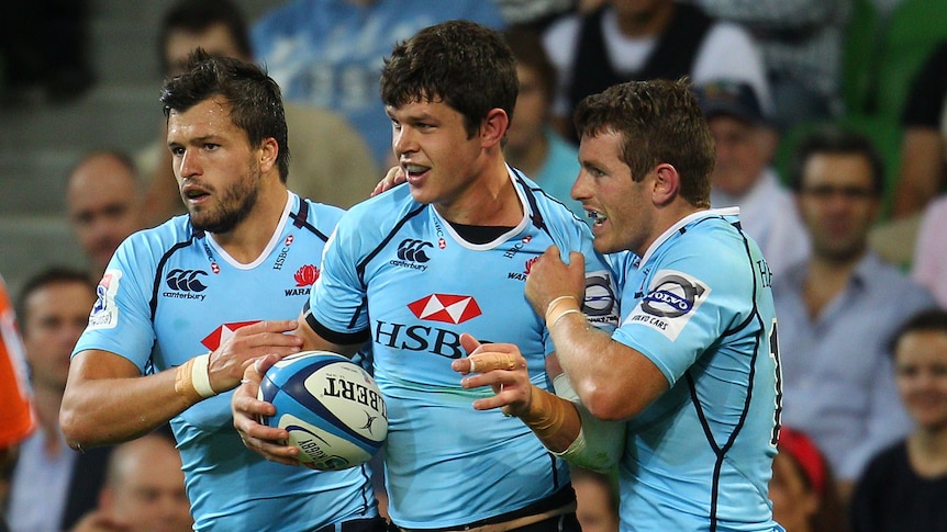 Waratahs centre Tom Carter has been dropped to make way for the returning Berrick Barnes