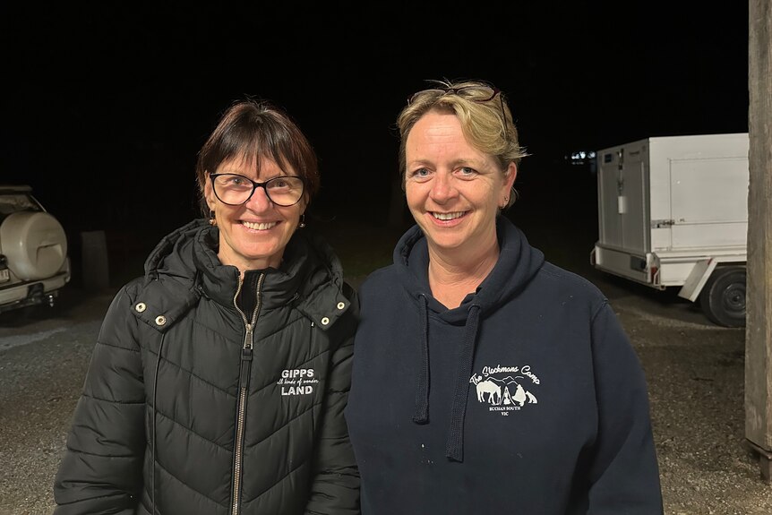 Janine Hayes pictured left wearing a black puffer jacket with Kathy Williams in a blue jumper at Stockmans Camp in Buchan