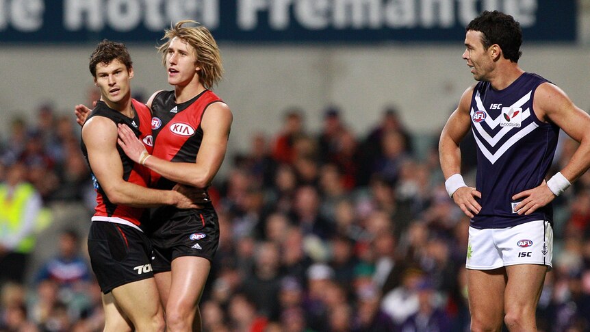 Essendon's Ben Howlett and Dyson Heppell celebrate at Subiaco Oval.
