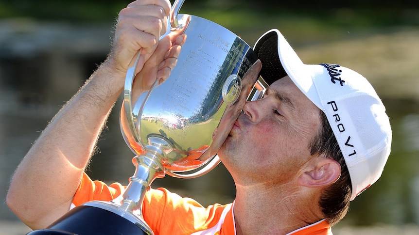 Greg Chalmers kisses the Kirkwood Cup after winning Aust PGA
