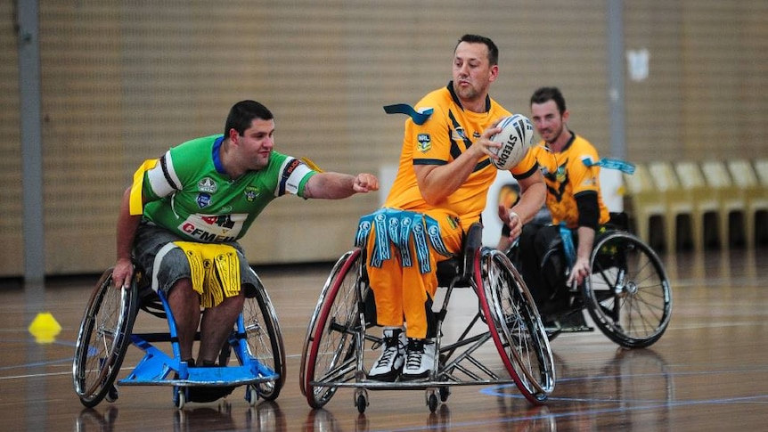 Wheelchair rugby league men's team play a game