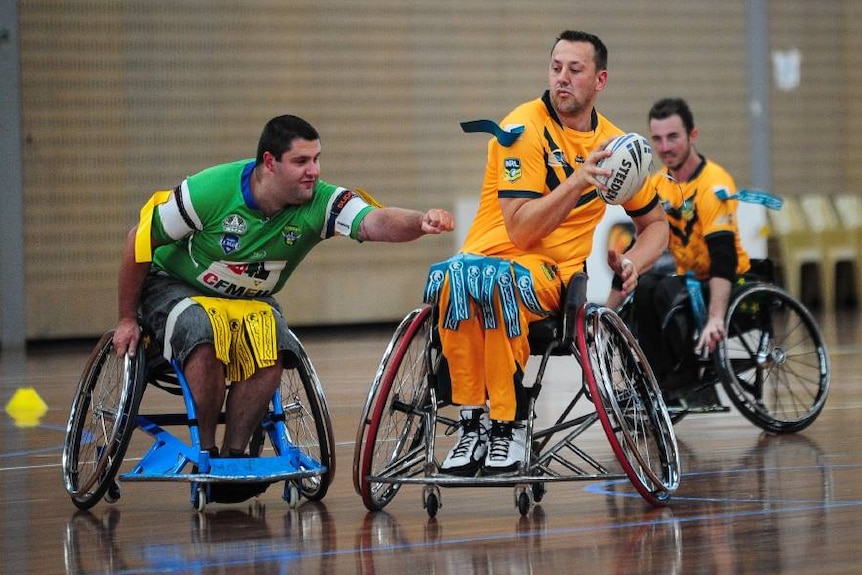 Wheelchair rugby league men's team play a game