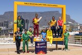 10 cricketers pose in their team gear in Cape Town with Table Mountain in the background to promote the Women's T20 World Cup.