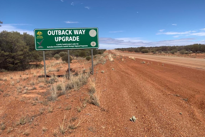 A sign saying 'Outback Way Upgrade'