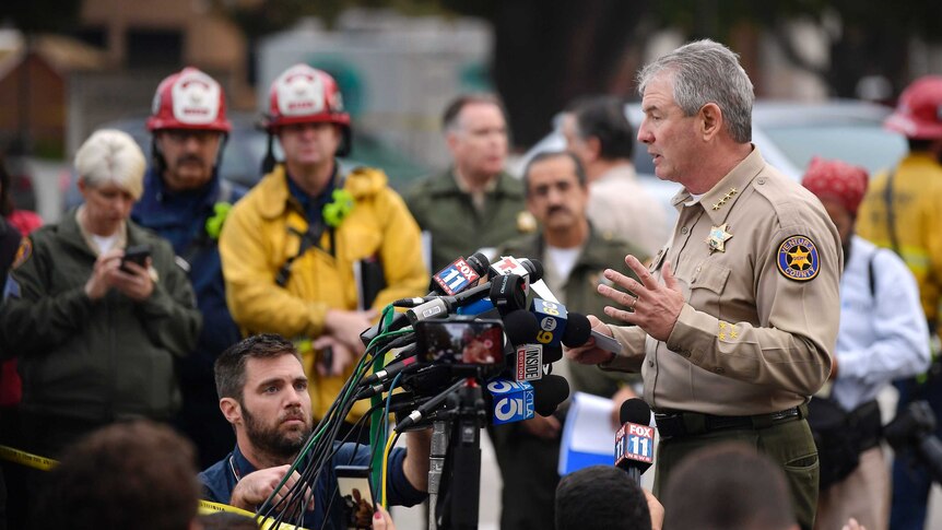 Ventura County Sheriff Geoff Dean speaks to a crowd of reporters.