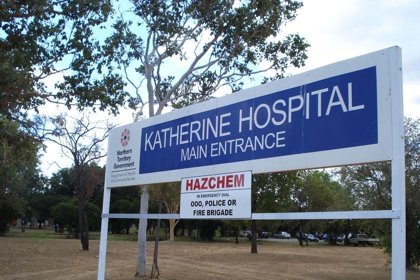 A roadside sign welcoming visitors to Katherine Hospital.