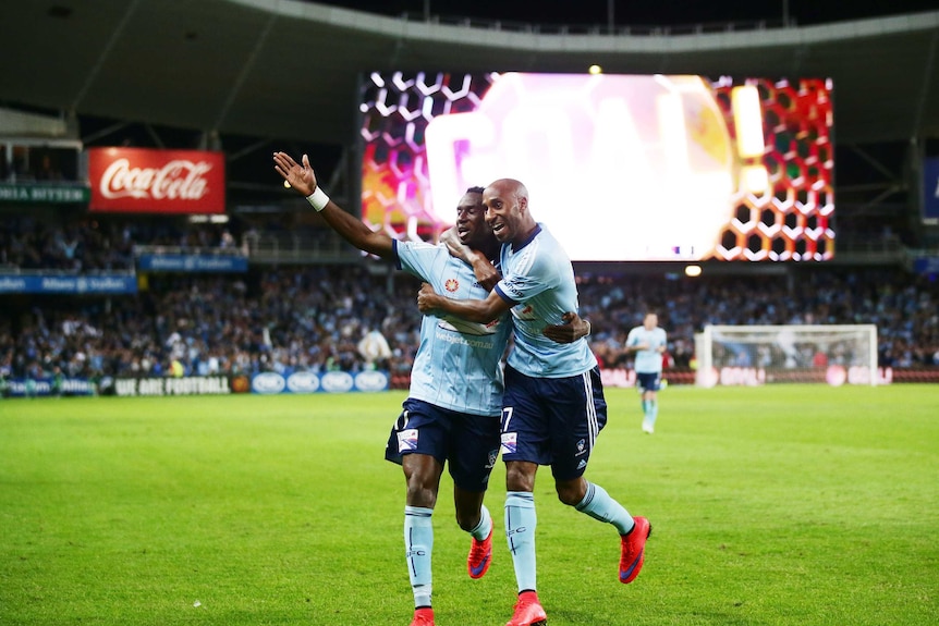 Sydney FC celebrates a goal against Adelaide United