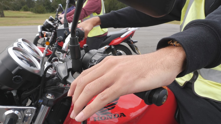 Your Future Rides participants sitting on bike doing rider training