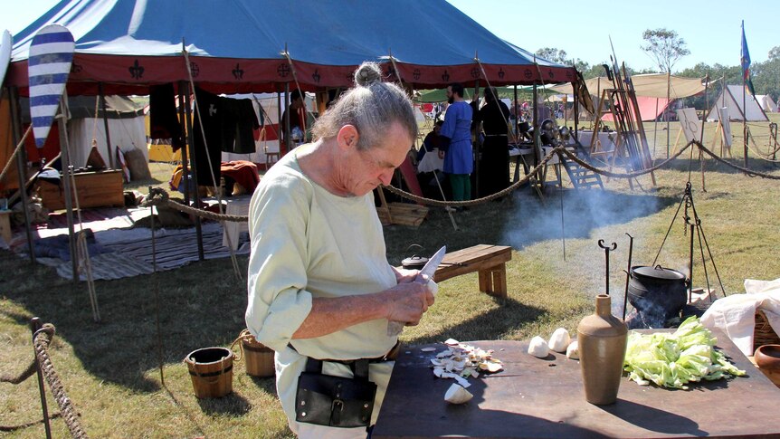 Squire cooks a meal at History Alive