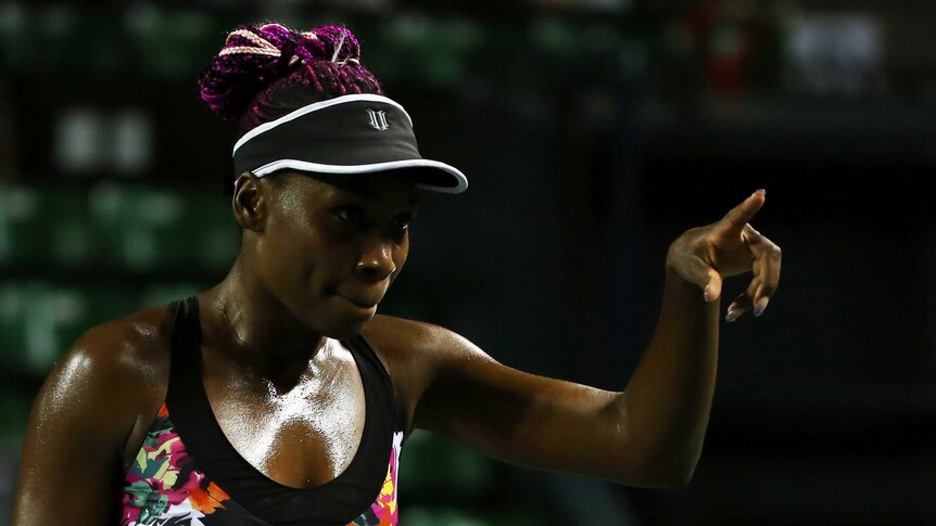 Venus Williams in action against Belarus' Victoria Azarenka at the Pan Pacific Open.