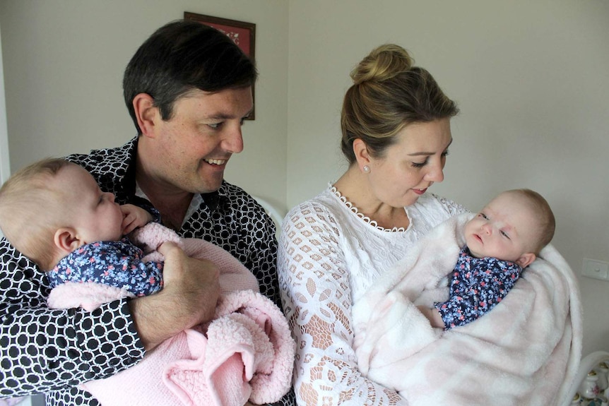Dave and Naomi Seddon with their baby girls.