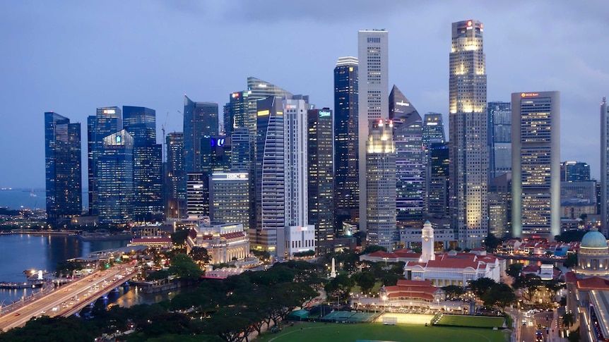 A general view of lit up buildings in Singapore.