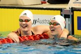 Sister act ... Cate and Bronte Campbell celebrate their one-two finish in the women's 50m freestyle final.